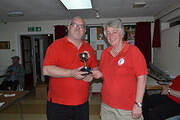 Paul receiving the trophy